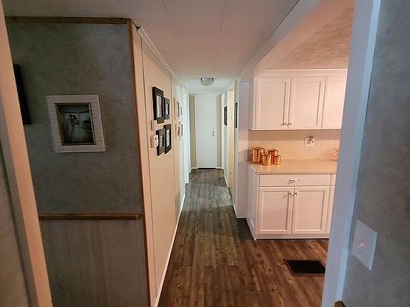 Hallway to bath and bedrooms