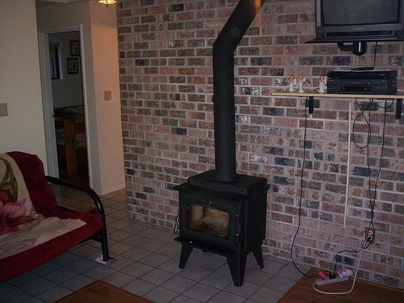 Free standing wood stove in living room