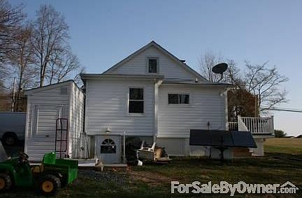 REAR OF HOUSE
						:
						Walk out basement door extension has spiral stairs to upstairs kitchen.