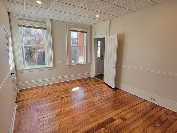 Bedroom, wood floors newly refinished