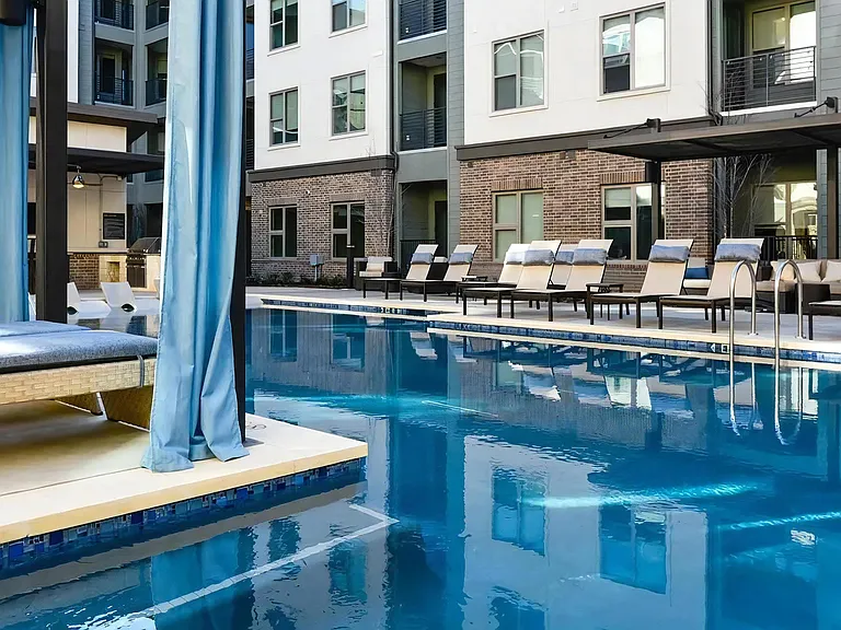 Private Poolside Retreat with Cabanas and Chaise Loungers