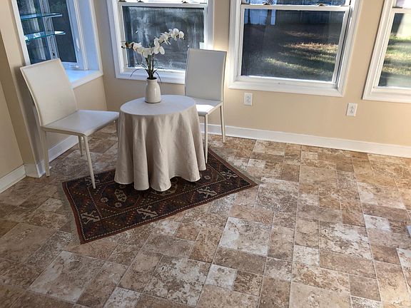 Sunny dining room overlooking the huge backyard.