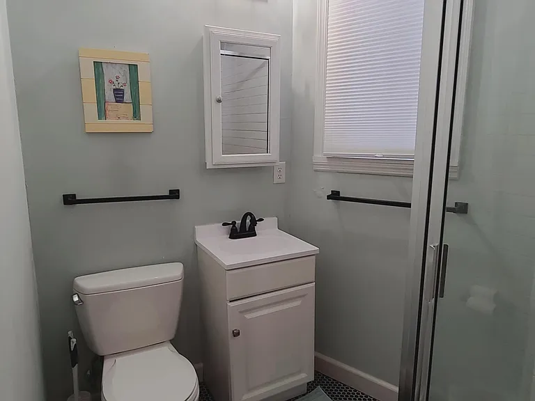 Full bath with tiled shower