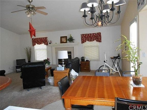 View from the kitchen, looking to the family room and informal dining area.