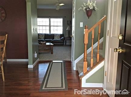 Entry
						:
						Two story entryway. New carpeting and hardwood floors throughout main level!