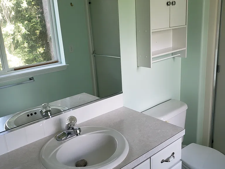 private bathroom connected to bedroom 2 middle floor