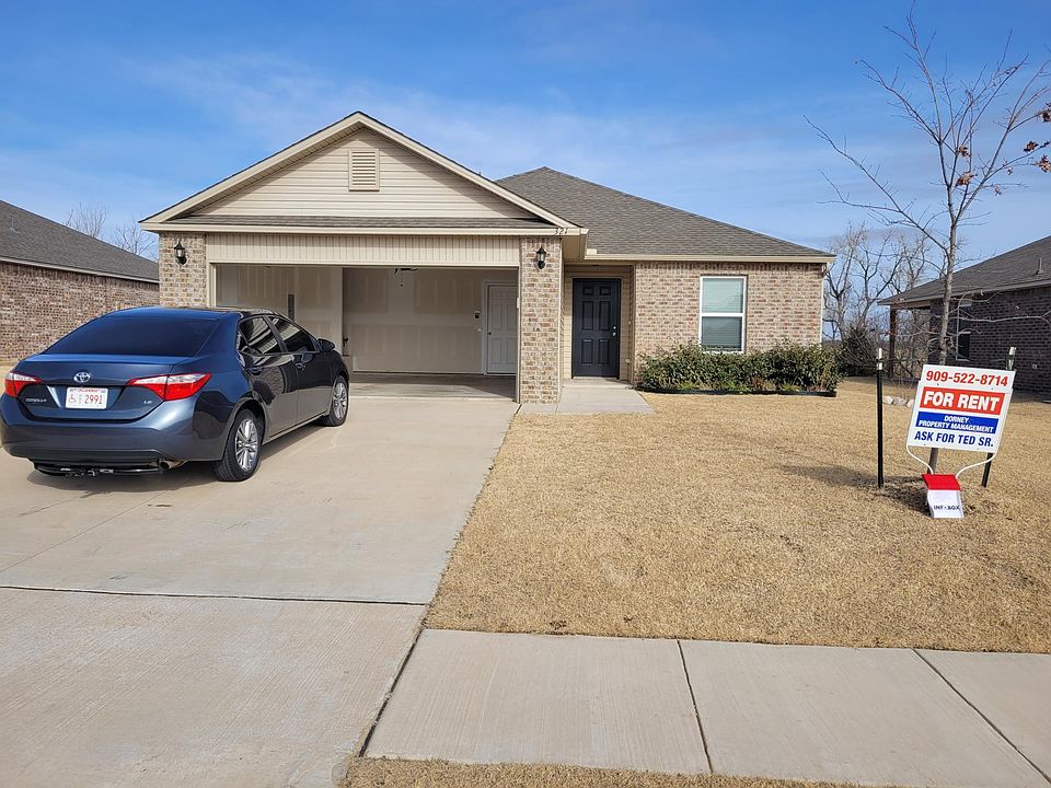 2 car garage. Auto garage door w/remote.