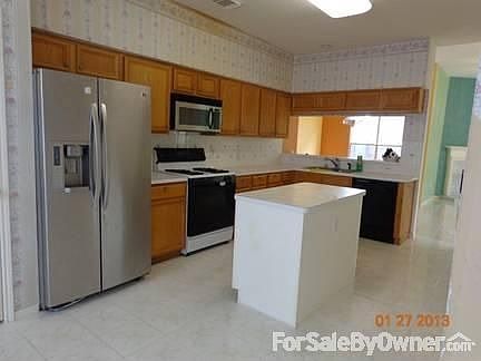 Kitchen from breakfast.
						:
						kitchen has ss refrigerator and microwave, island and ample space.