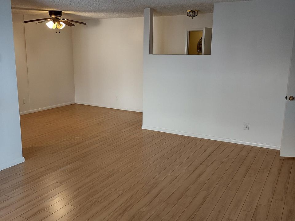 Living room and dining room, front door. Bedroom #1 to the left of dining room, bedroom #2 on the right.