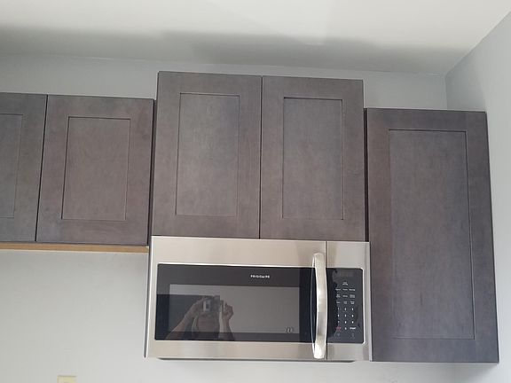 New cabinets and stainless steel appliances