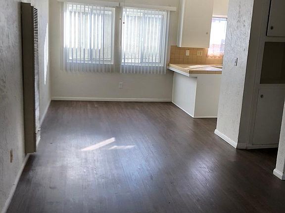 Upon entering, dining area and kitchen straight ahead, living room and 1/2 bath to the right.
