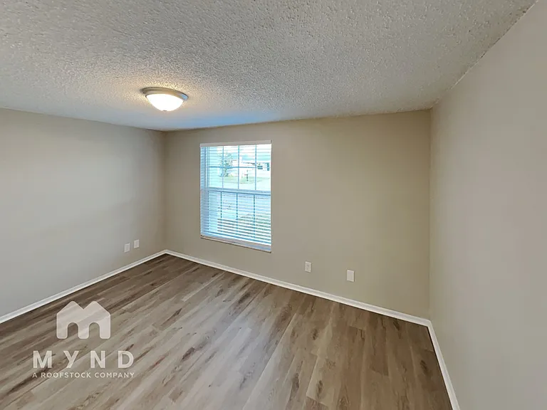 7606 Woodland Oaks Ct — Photo 14