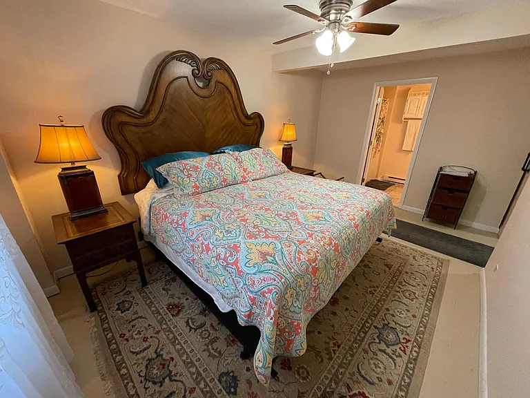 Main Bedroom with private bath and sliding barn door.