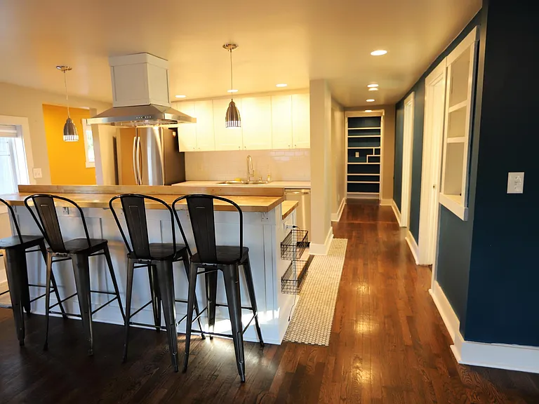 Kitchen to left, hallway to the right.