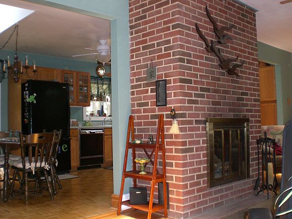 Brick center-wall fireplace