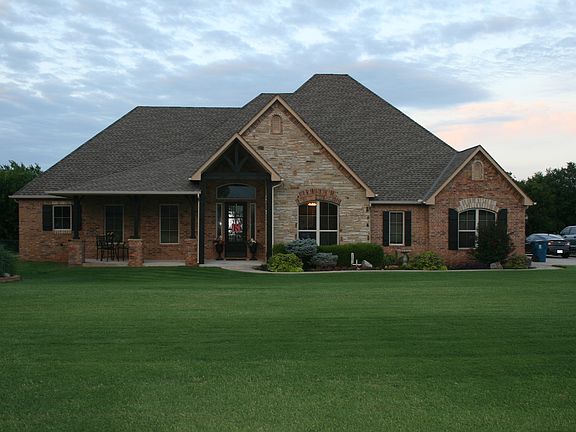 Front Exterior on acre lot