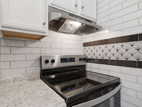 Kitchen features brand new appliances