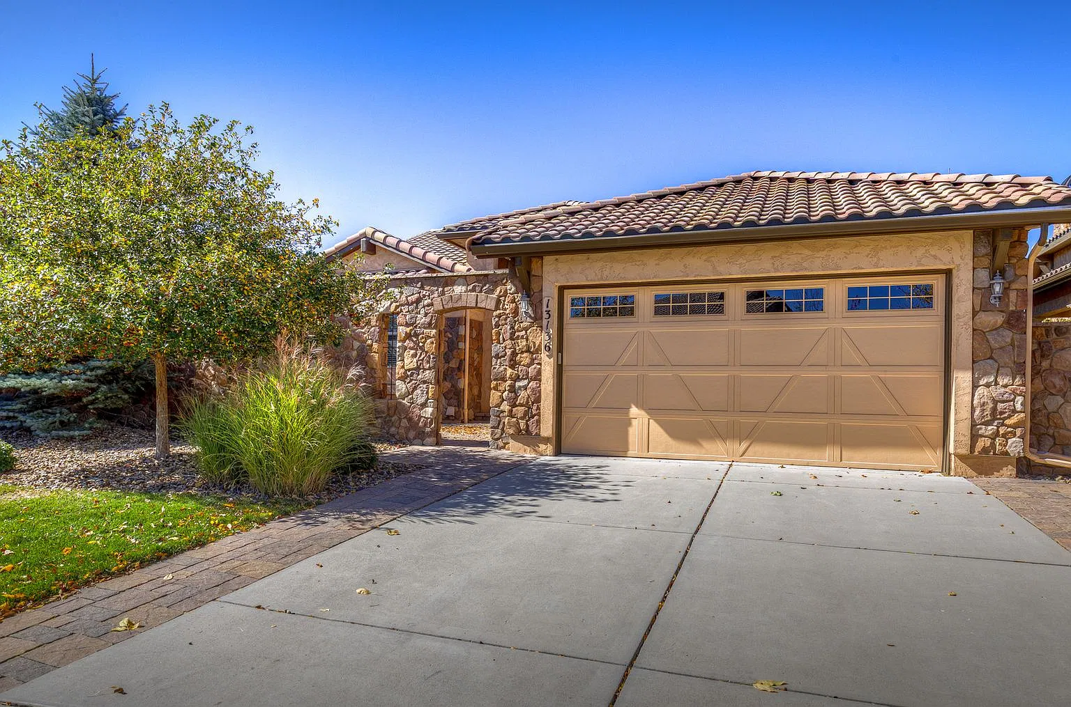 Luxury Golf Course Ranch Walkout in Flying Horse | Stunning AFA & Mountain Views — Photo 1