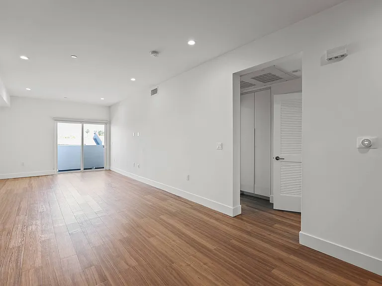Dining and Living Room Space with Recessed Lighting, Vinyl Flooring, and Patio