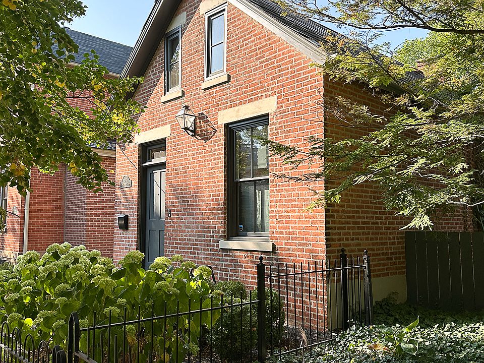 Classic one and a half story brick cottage in German Village