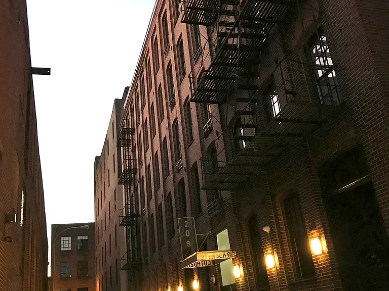 The building entrance on Cuthbert St: a quiet, low-traffic but full-size street just north of the Arden Theater.