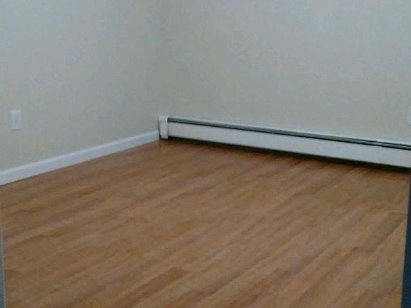 2 bedrooms w/ new hardwood flooring (both same size)