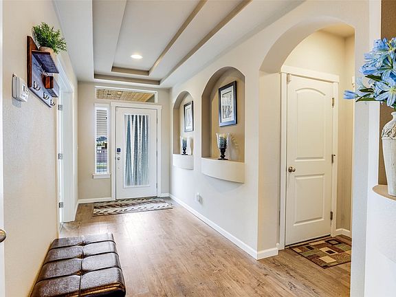 Entrance to the home opens to views into the main living area and a glance at all the detail and character throughout.>