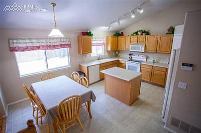 Spacious dining and kitchen, with island.
