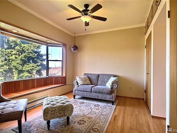 Bay windows, hardwood floors and built-ins.