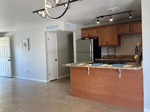 Open concept kitchen, dining, great