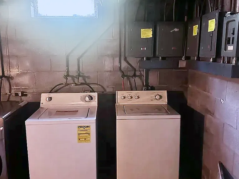 Access to unit-specific washer and dryer in lower level