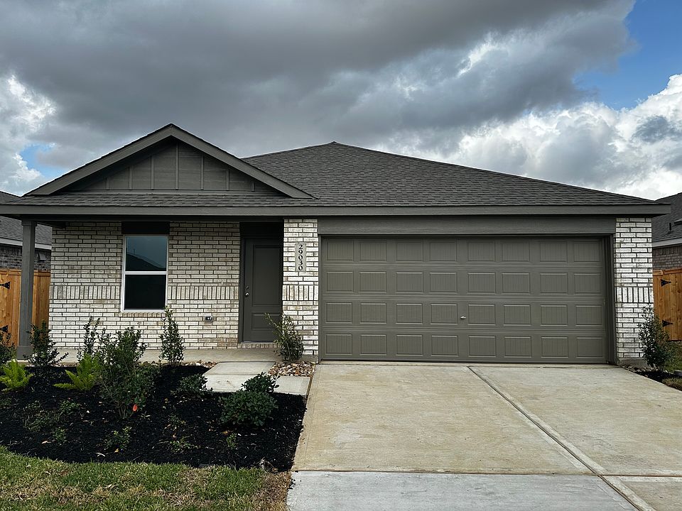 Excellent curb appeal with a lush landscape