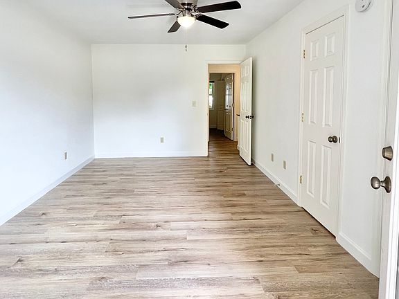 Primary Bedroom (Upstairs - Front with Balcony)