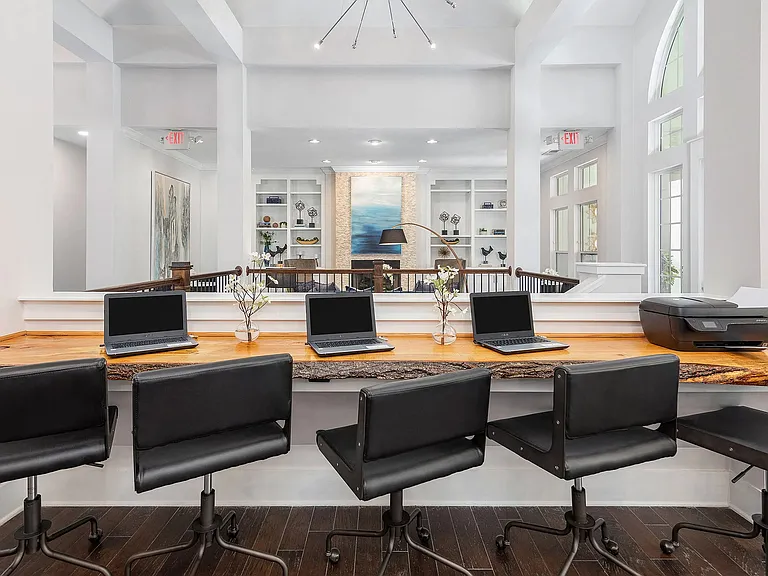 Resident business center with coworking stations, high-speed internet, and printing servicesperfect for remote work in Charlotte apartment living.