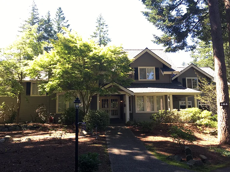 Front of home, private down a lit private driveway. Home Security System and sprinklers. The two trees in front of the house have been removed.