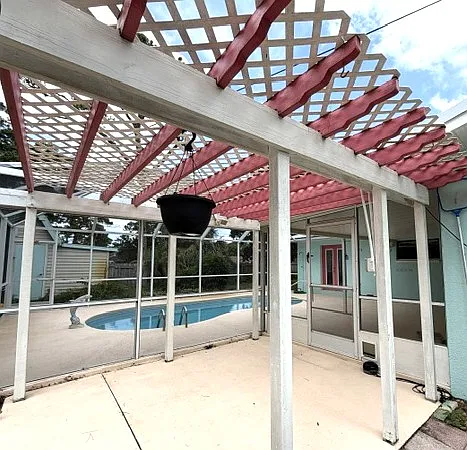 The pergola is a perfect place for all your hanging plants.