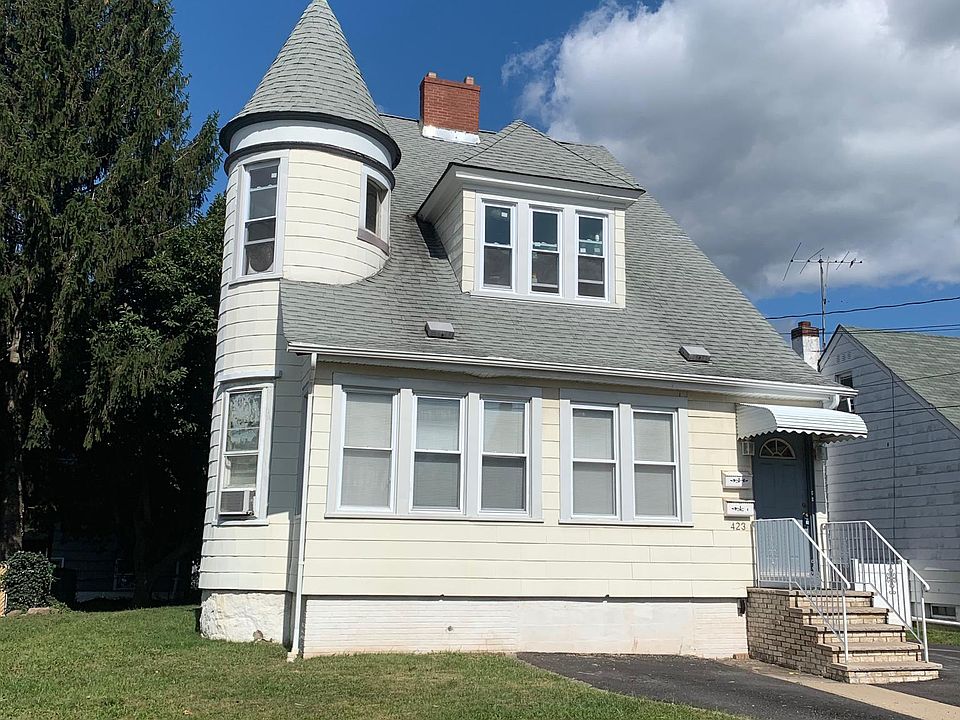 Front of House with Entrance to the 2nd floor.