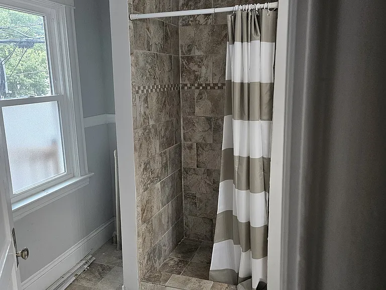 Upstairs bathroom with shower