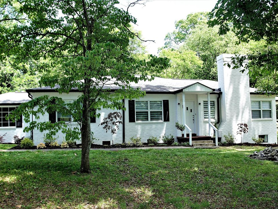 Beautifully preserved and restored 1950's brick ranch home