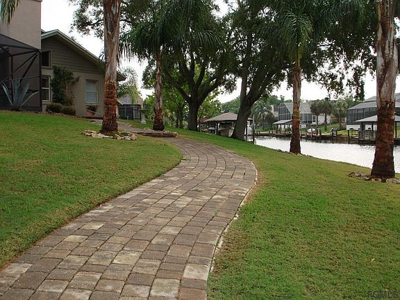 Pavered walkway to dock