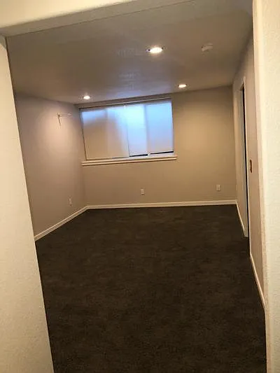 Large basement bedroom or flex room. New carpet scheduled for installation in early April.