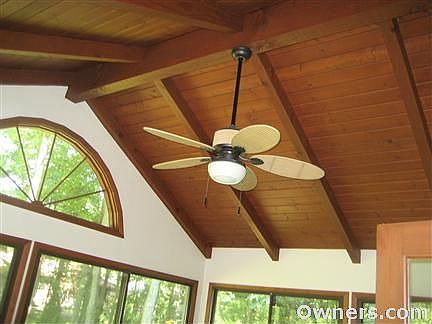 Three season room with floor to ceiling windows