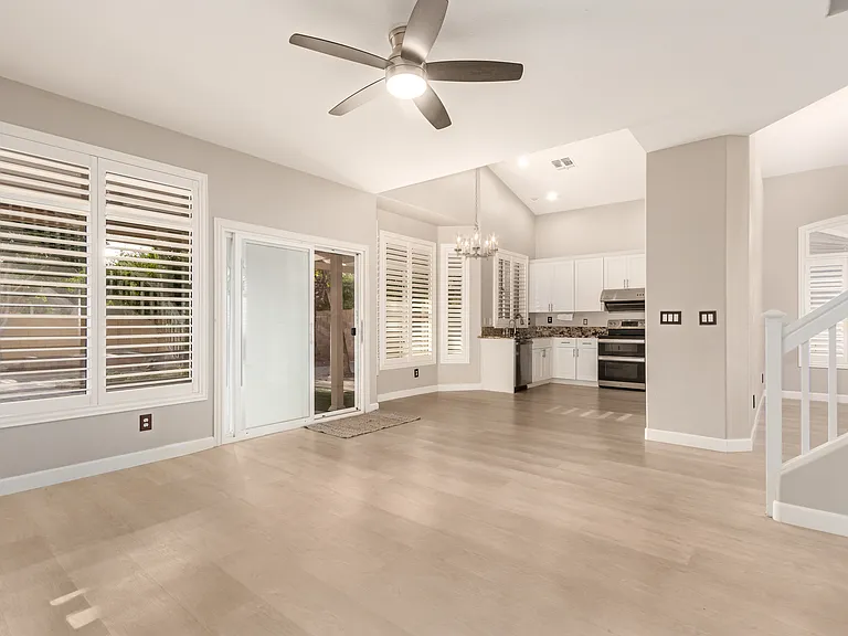 Family Room Connected to the Kitchen with Sliding Glass Doors Leading to the Backyard. (Best choice)