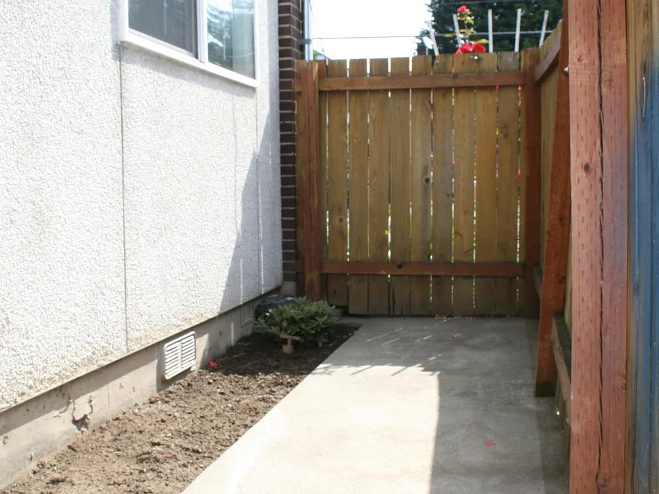 Fenced Private Patio and Garden Bed