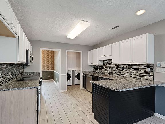 5th image of 1703 Tamhaven Ct