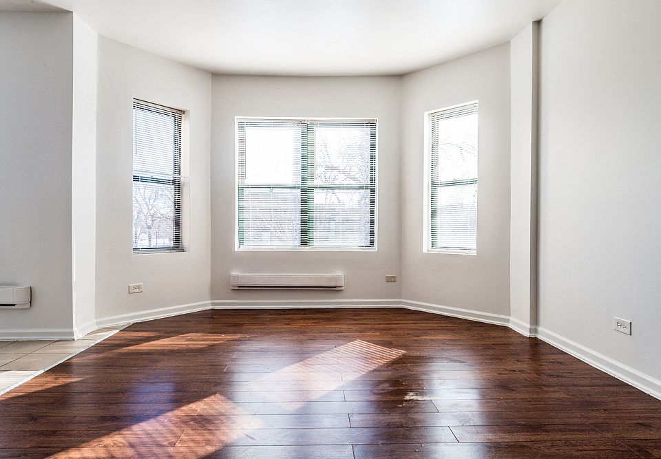 Plenty of natural light in the living room at 7706 S Coles!