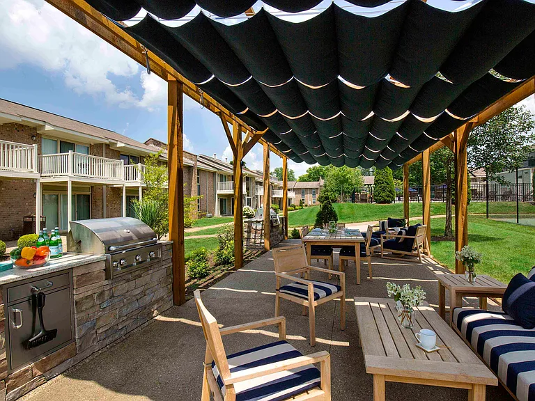 Outdoor grills and shaded dining area