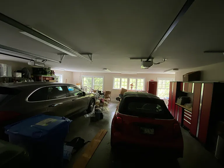 Huge 2 car garage with lots of storage space.