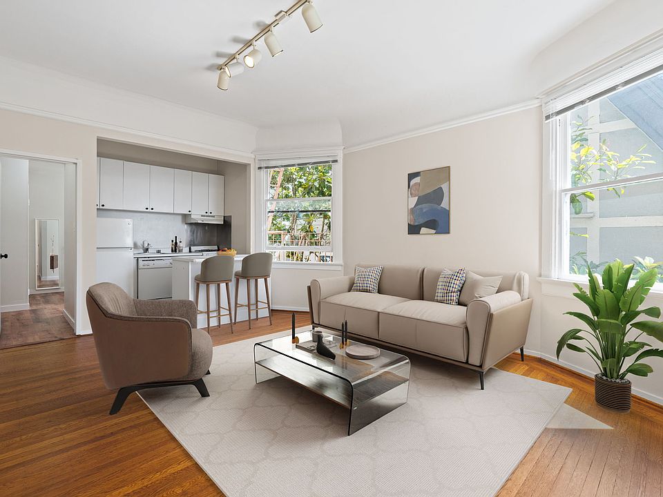 Virtually staged living/dining/bedroom area