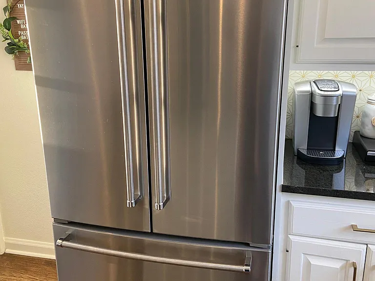 French door Kitchen Aid stainless refrigerator with internal ice maker